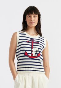 Top senza maniche lavorato a maglia con righe navy e bianche, caratterizzato da un design con un'ancora rossa e un personaggio dei cartoni animati. Dettagli a costine sul collo e sull'orlo.