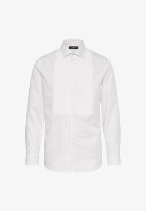 Camicia bianca a maniche lunghe, con pannello frontale testurizzato e colletto classico. Realizzata in tessuto leggero e morbido con chiusura a bottoni.