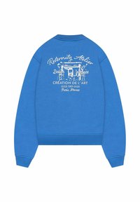Niebieski bawełniany sweatshirt z nadrukiem na plecach, zawierającym białe teksty i grafiki, ściągacze u rękawów oraz okrągły dekolt.