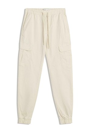 Pantaloni cargo de culoare crem, din bumbac, cu talie elastică, șnur și două buzunare laterale cu clapete. Acțiuni elastice la glezne.