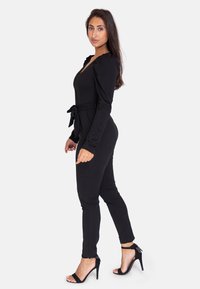 Elara Tuta jumpsuit - schwarz