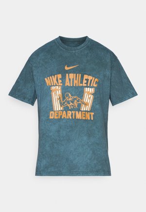 Blue short-sleeve T-shirt with orange "Nike Athletic Department" text, Nike swoosh, and muscular figure breaking classical columns graphic.