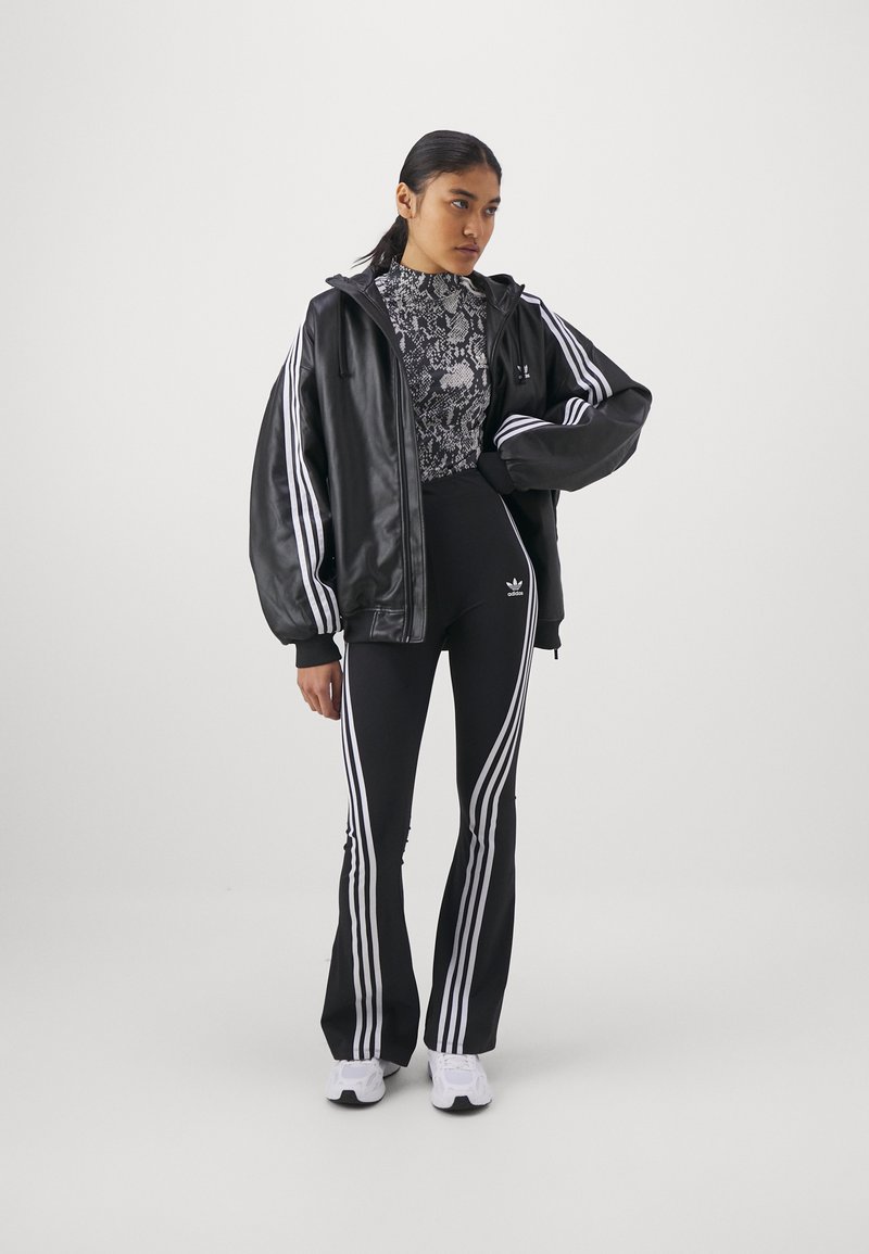 flared adidas tracksuit bottoms