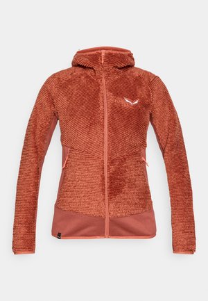 Fleece-takki, jossa on poltettu oranssi väri, huppu, teksturoitu kangas, vetoketjusuljenta ja kontrastiväriset sileät paneelit alaosassa.