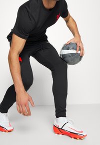 Nike Performance Jogginghose - black