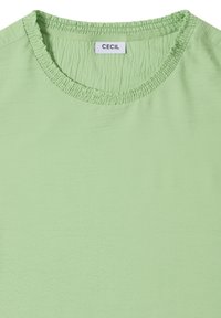 Jasnozielony, fakturowany top z okrągłym dekoltem i marszczonym kołnierzem. Metka z napisem "CECIL". Posiada subtelny, pomarszczony wzór powierzchni.