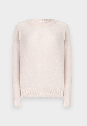 Light pink knitted sweater with a crew neckline, long raglan sleeves, and ribbed hems, displaying a soft, textured fabric.