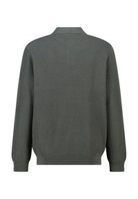 Tummanvihreä ribbed neulepaita, jossa on kaulus ja pitkät hihat. Paidassa on tekstuuri kuvio ja tiukat hihansuut sekä vyötärö.