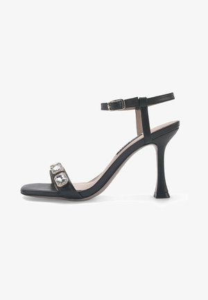 Nine West Korolliset sandaalit - black