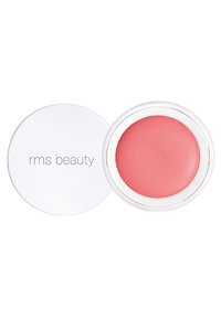 Blush RMS Beauty dans un récipient rond blanc, avec un produit rose doux et lisse visible à l'intérieur. Le couvercle est simple avec un texte minimal.