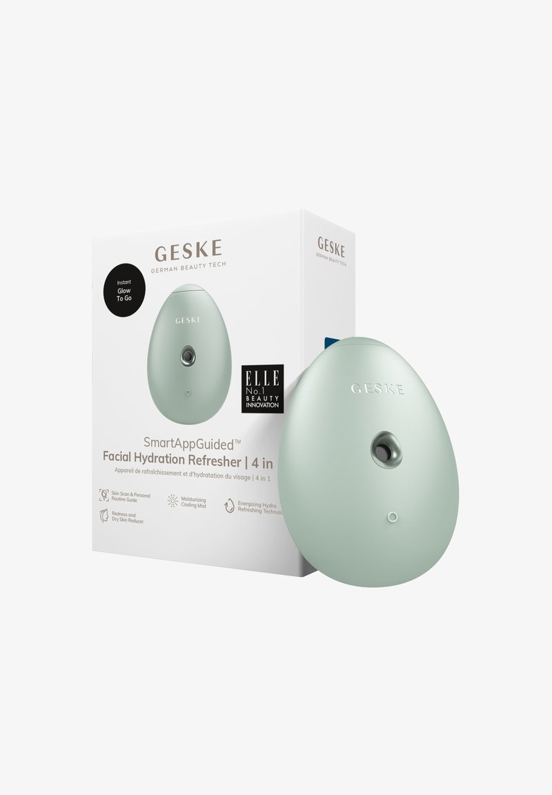 Light green facial hydration refresher with a smooth, oval shape; features an on/off button and is packaged in a sleek white box.