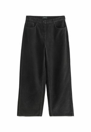 - Spodnie materiałowe