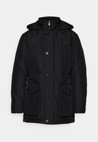 Veste d'hiver matelassée noire avec capuche, fermeture éclair et boutons à l'avant, deux poches à rabat avec boutons, et poches verticales latérales.