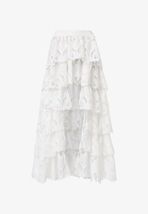 White lace skirt featuring a tiered design with scalloped edges. The material has a floral pattern and texture, creating a layered appearance.
