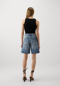 G-STAR HIGH BERMUDA CLEAN EDGE - Denimové šortky - sun faded paradiso blue