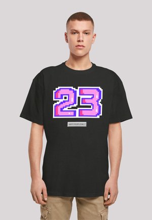 Black cotton t-shirt featuring large pixelated number "23" in pink and white, with text "HAPPYPEOPLEONLY" in a rectangular box below.