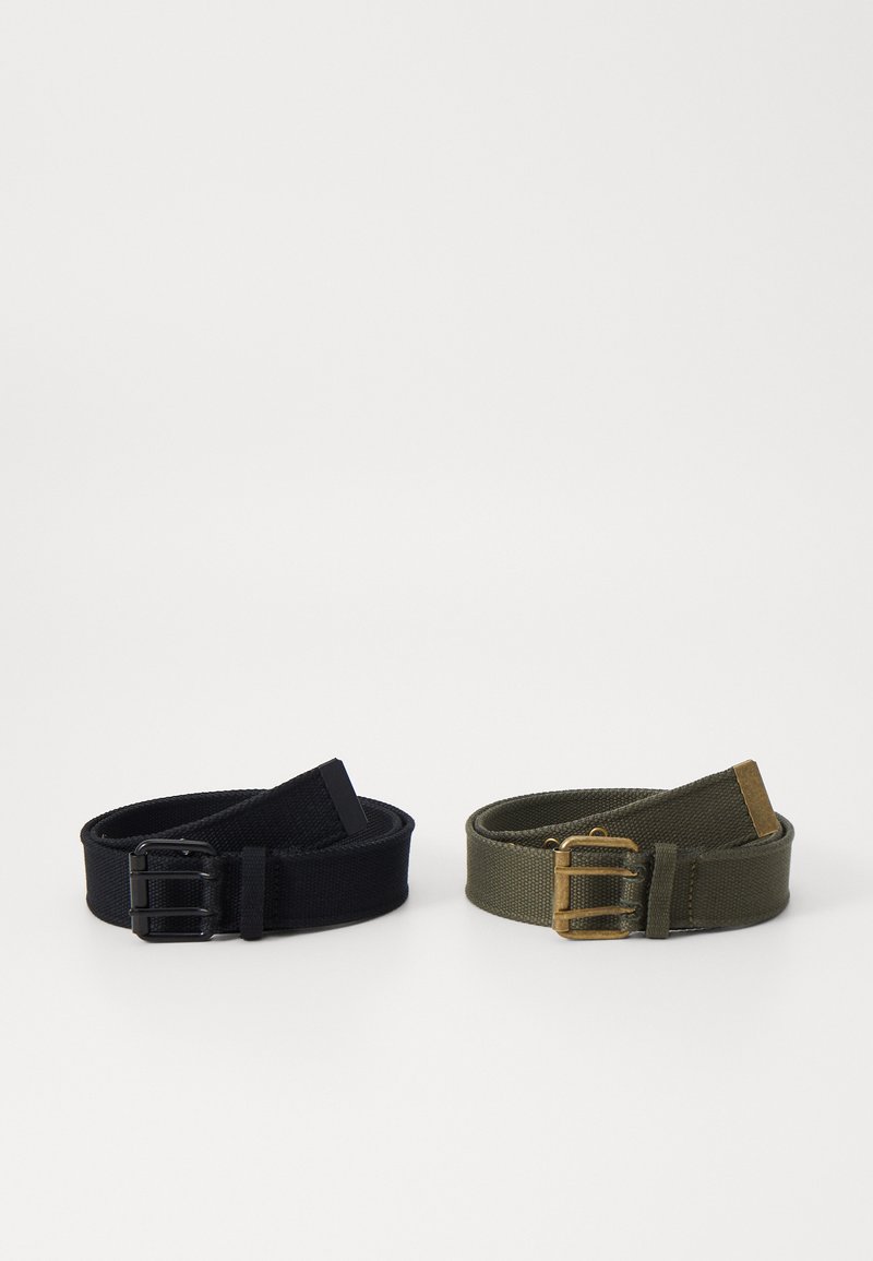 Two fabric belts: a black one with a matte black buckle, and an olive green one with a brass buckle. Both are flat, adjustable, and textured.