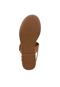 Sole di sandalo marrone con un motivo testurizzato e rigato; forma piatta e larga; design minimale; mostra i dettagli del marchio.