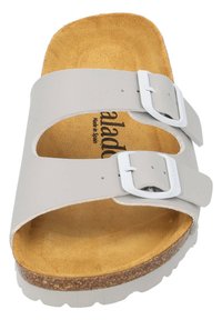Gray slide sandal with two adjustable buckle straps, cork footbed, and a textured, tan insole. Made in Spain, flat rubber outsole.