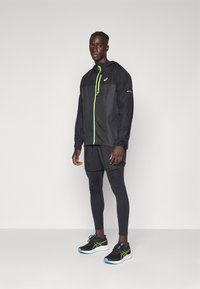 ASICS FUJITRAIL PACKABLE JACKET - Neperpučiamoji striukė - performance black