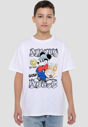 White cotton t-shirt featuring a graphic of a cartoon character with black ears, red shirt, blue jeans, and playful text elements in various colors.