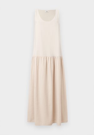 Sleeveless maxi dress in light beige cotton with gathered waist and flowing skirt. Smooth texture and simple design.