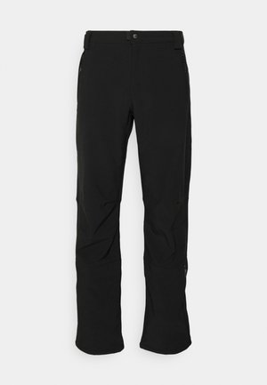Pantaloni soft-shell neri con una texture liscia, dotati di chiusura con bottone, tasche laterali con zip e vestibilità rilassata con gamba leggermente svasata.