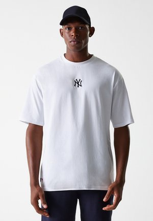 White crew neck t-shirt made of cotton, featuring a black embroidered NY logo on the chest and short sleeves. Casual fit with straight hem.