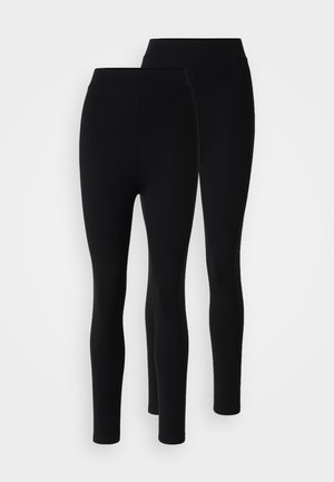 Mustad mustad retuus kahes suuruses, millel on sile tekstuur, kõrge vöökoht ja keha lähedane disain. Sobivad nii igapäevaseks kui ka sportlikuks kandmiseks.