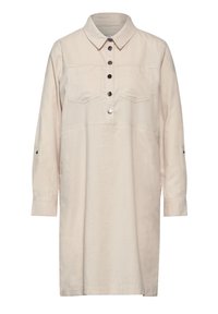 Robe chemise à manches longues en tissu beige clair, avec une fermeture à boutons sur le devant, deux poches poitrine et des poignets avec des détails en boutons.