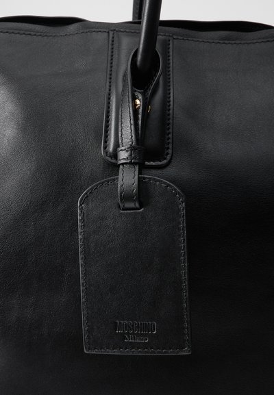 MOSCHINO FOLDING BAG - Sac week-end - nero