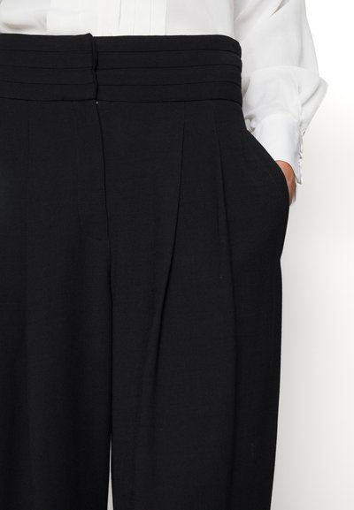 Iro JEON - Pantalon classique - black