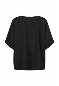 Schwarzes Kurzarmoberteil mit lockerer, kastiger Passform. Leichter Stoff mit texturierter Oberfläche. Rundhalsausschnitt und gerader Saum an der Taille.