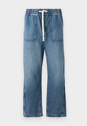 Blue denim pants with an elastic waistband and white drawstring. Features two front pockets and a wide leg design, with a smooth texture.