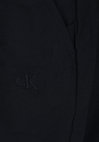 Calvin Klein Pantaloni sportivi - black