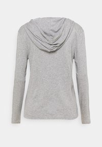 Grey long-sleeve hoodie in soft, textured fabric; features a draped hood and sleek, minimal design without any visible hardware or accents.