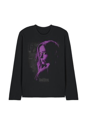 Black long-sleeve shirt with a purple stylized woman’s face and Daredevil logo on a brick wall background.