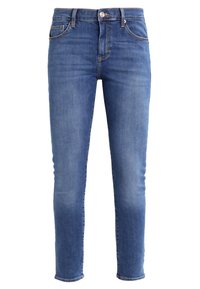 Blå denimjeans, slim fit, design med fem fickor, ljus tvätt med subtila blekningar, hög midja, silverknappsstängning och bältesringar.