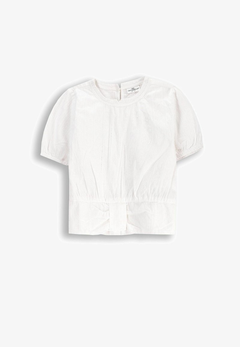 Biała bluzka z krótkim rękawem o teksturowanym wzorze, z okrągłym dekoltem i marszczonym pasem z kokardą na plecach.