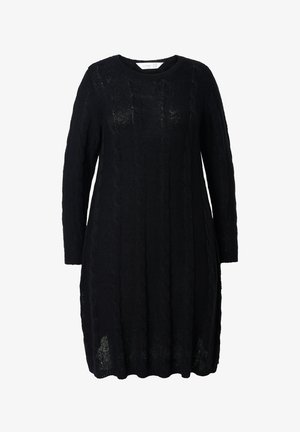 Vestito nero a maglia con maniche lunghe, caratterizzato da un motivo a treccia testurizzato e una silhouette leggermente oversize. Collo rotondo e spacchi laterali.