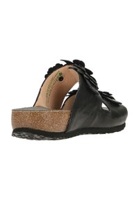 Mustat nahkasandaalit, joissa on kukkasomisteet, korkkipohja, avonainen takakappale, tekstuuripinta ja pehmustettu pohja mukavuutta varten.