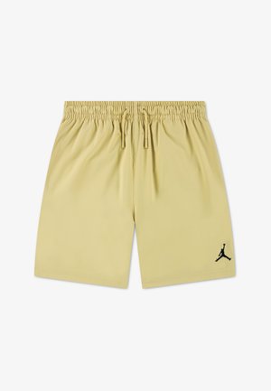 Jasnobeżowe szorty z elastycznym pasem ze sznurkami i małym czarnym logo Jumpman na lewej nogawce.