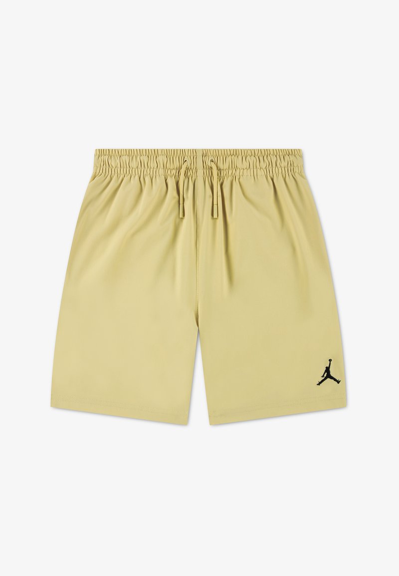 Ανοιχτό μπεζ σορτς με ελαστική μέση και κορδόνια, με μικρό μαύρο λογότυπο Jumpman στο αριστερό πόδι.