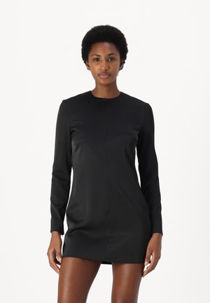 Black long-sleeve dress with a high neckline, featuring a front zipper and smooth texture, finished in a tailored, minimalistic design.