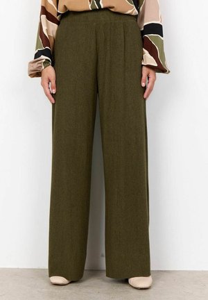 Olive green wide-leg trousers made of ribbed fabric with a textured finish, featuring a high waist and side pleats, paired with neutral shoes.
