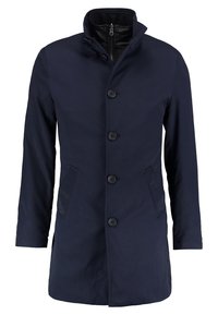Cappotto blu navy realizzato in tessuto testurizzato, con colletto alla coreana, bottoni frontali e due tasche laterali. Design di lunghezza media con accenti minimi.