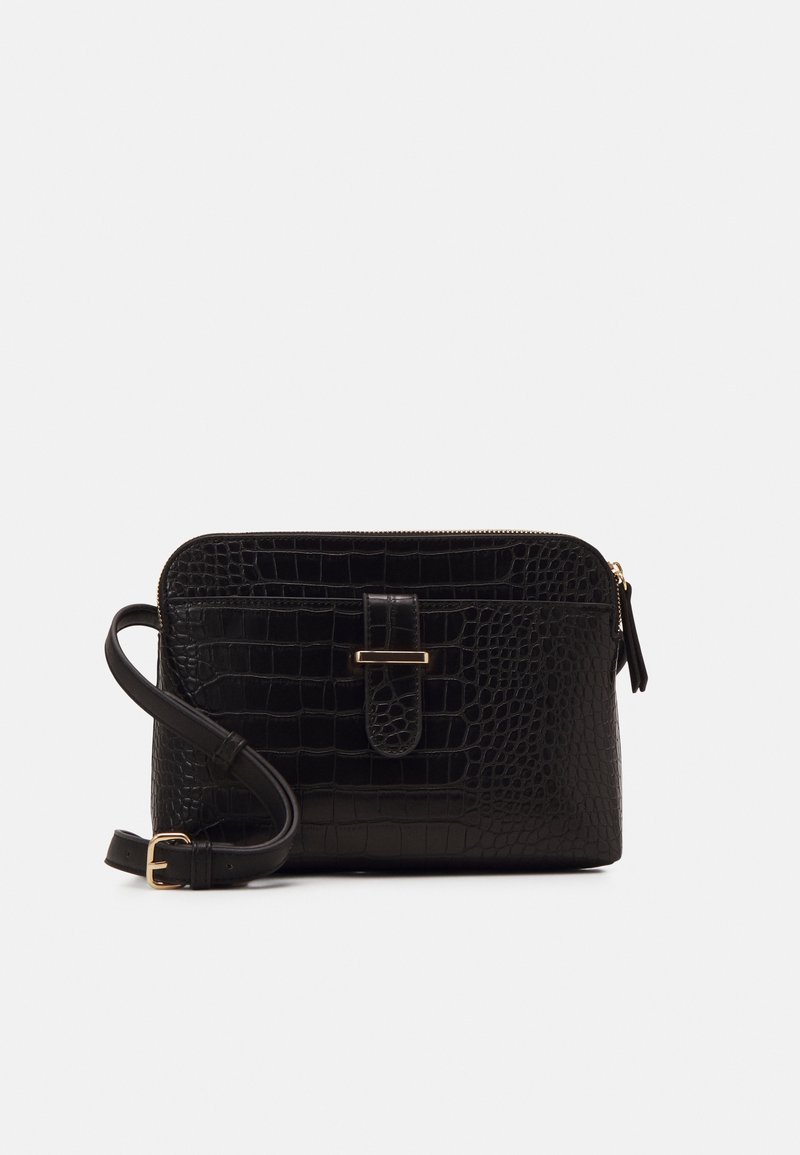 Black faux leather crossbody bag with a crocodile texture, zip closure, and a front strap accent. Features an adjustable shoulder strap.
