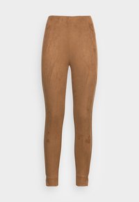 Leggings marron en tissu doux et texturé. Ils présentent une taille haute et des chevilles fuselées pour une silhouette ajustée.