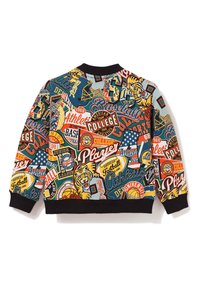 Dziecięca kurtka z kolorowymi, vintage'owymi naszywkami sportowymi przedstawiającymi piłkę nożną, koszykówkę, baseball, tygrysy oraz teksty i grafiki związane z uczelniami.