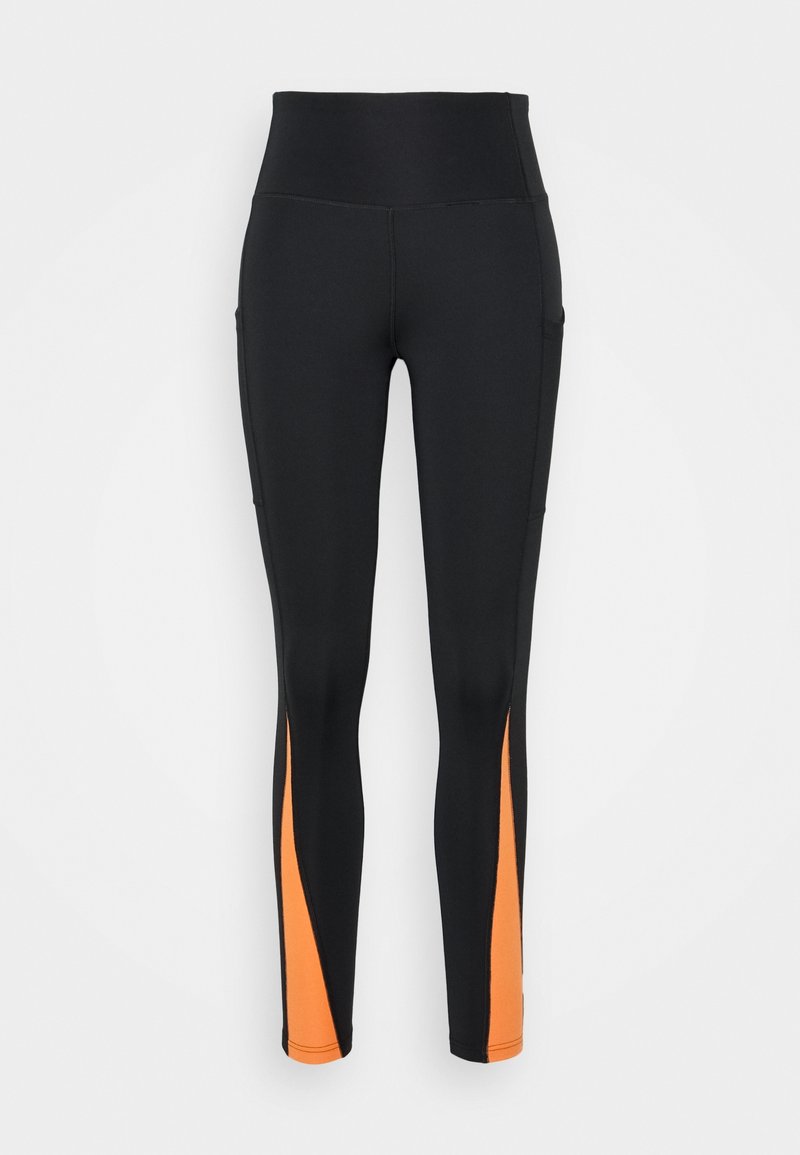Black high-waisted leggings with side pockets and orange triangular panels on the lower outer legs.